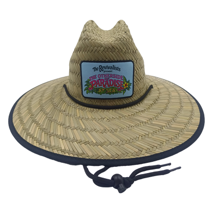 Straw hat with a colorful patch on a white background