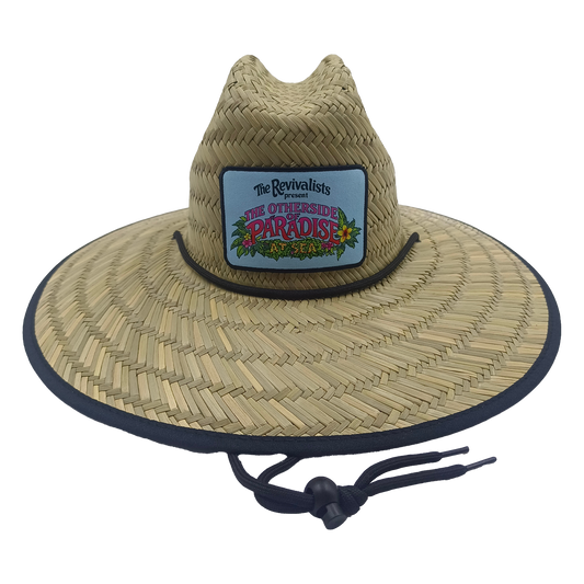 Straw hat with a colorful patch on a white background