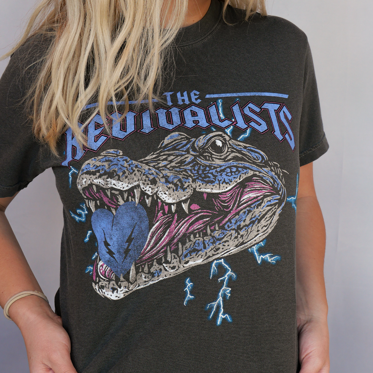 Black t-shirt with alligator graphic.