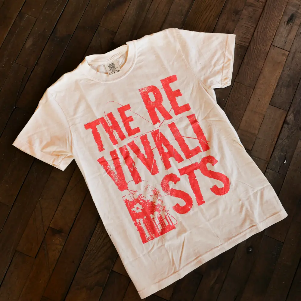 White t-shirt with red text.