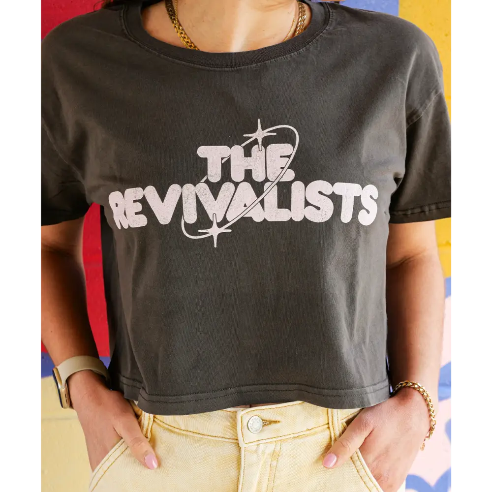 Black crop top t-shirt with ’THE REVIVALISTS’ printed in white letters on the front.