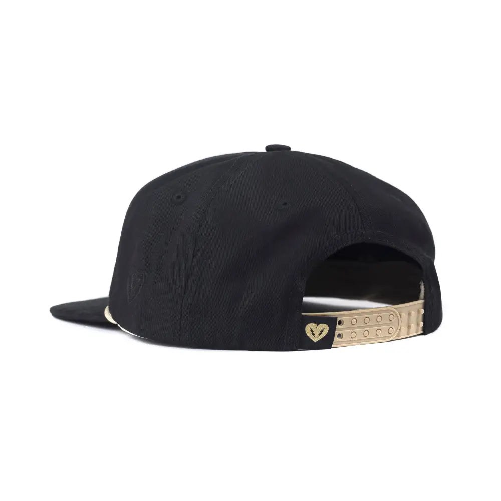 Black snapback cap with a gold-colored adjustable strap.