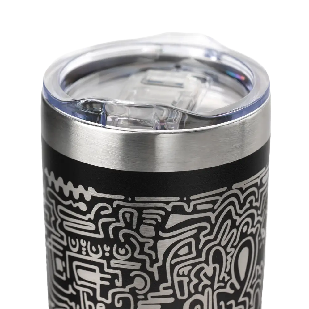 Insulated travel tumbler with intricate black and white abstract design on its exterior.