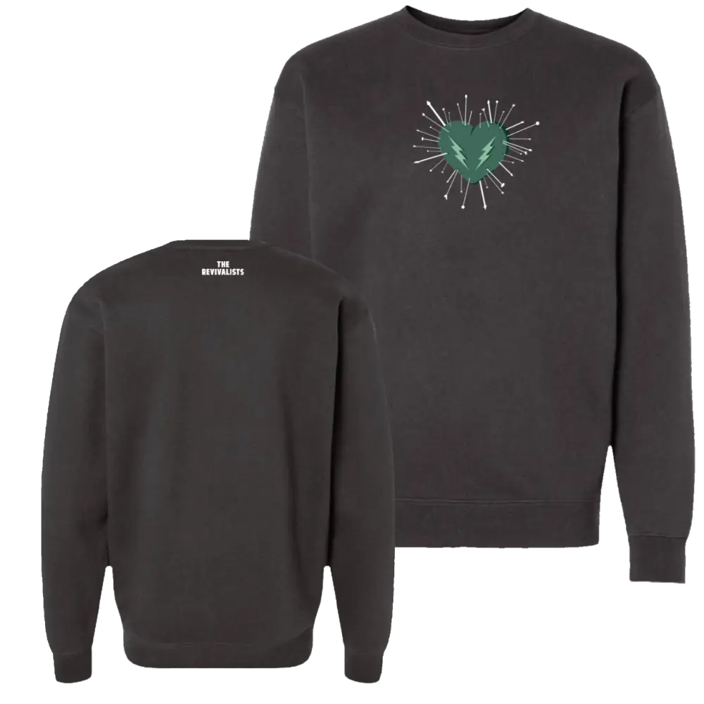 Dark gray crewneck sweatshirt featuring a green heart with lightning bolt and white radiating lines on the front, branded ’the revivalists’ at the back.