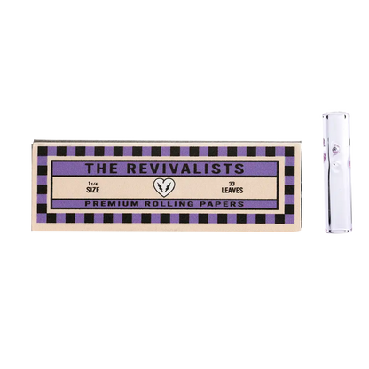 Vintage-style cigarette or rolling paper packaging labeled ’The Revivalists’ with purple and gold design elements.