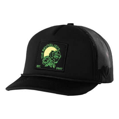 Black trucker-style cap with a green and yellow logo patch featuring a tiger design.