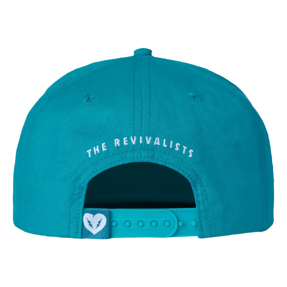 Teal snapback cap with ’THE REVIVALISTS’ text visible on the back.