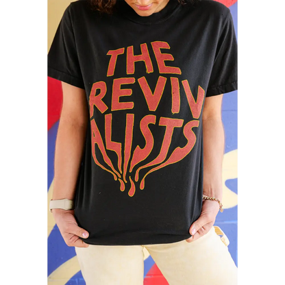 Black t-shirt with ’THE REVIVALISTS’ printed in orange lettering.