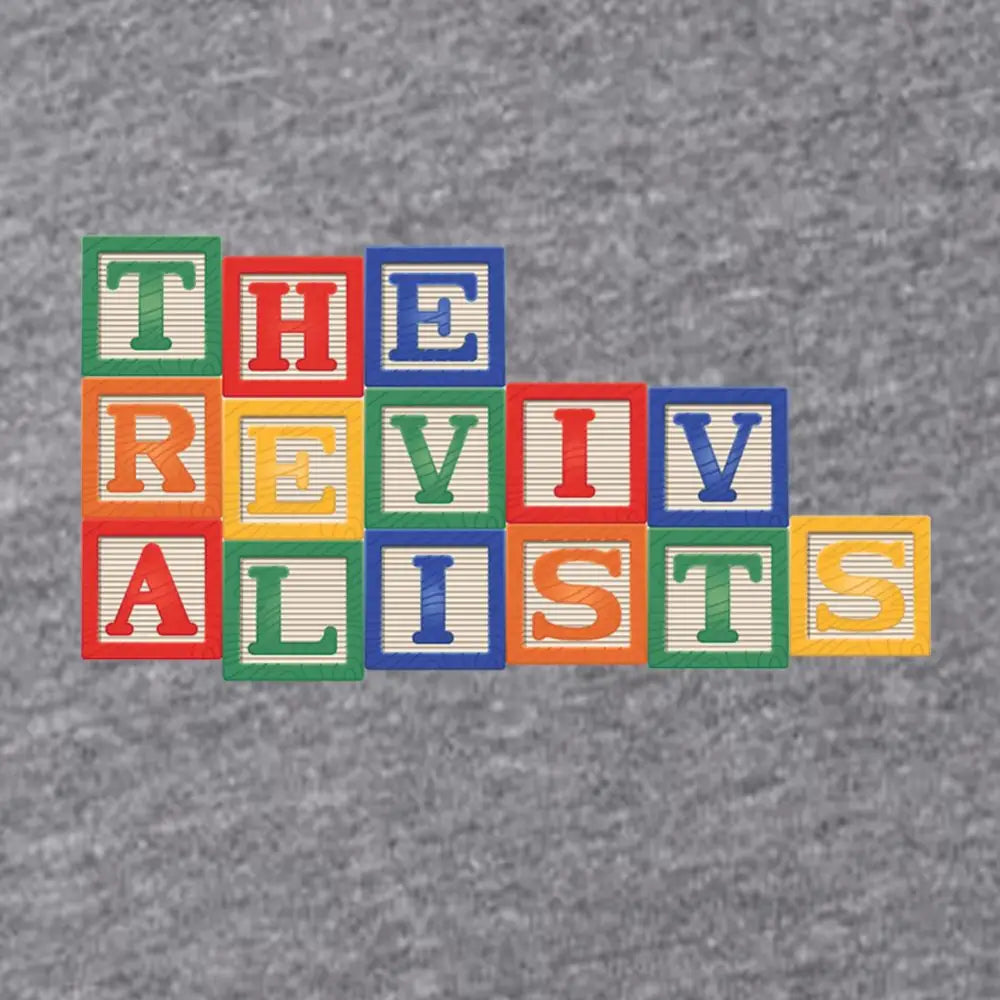 Colorful wooden alphabet blocks spelling out ’THE REVIVALISTS’