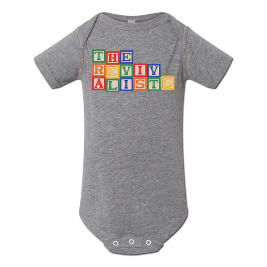 Gray baby onesie with colorful alphabet blocks spelling ’THE RIVALISTS’ on the front.